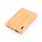 Rectangular bamboo power bank with USB ports on a white background.