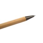 Close-up of a wooden pen with a black tip on a white background.