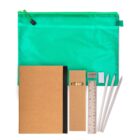 Green pouch with notebooks, pencils, ruler, sharpener, eraser, and a pencil case laid out.