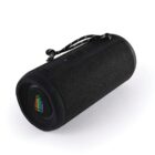 Black portable Bluetooth speaker with a carry strap and colorful logo on the side.
