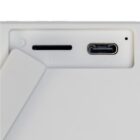 Close-up of a white device showing a TF card slot and a DC 5V charging port.