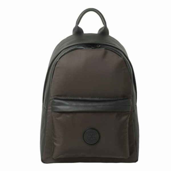 Black backpack with a front pocket and a circular patch, photographed against a white background.