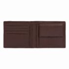 Open brown leather wallet with card slots and a coin pocket visible.