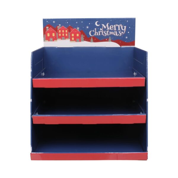 Empty cardboard display shelf with Merry Christmas and houses on a snowy background.