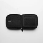 Black zippered wallet open to show card slots and a mesh ID window on a white background.