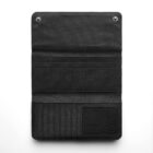 Open black fabric wallet with card slots, a clear ID window, and snap buttons on white background.