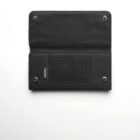 Black fabric wallet open, showing mesh ID slot and snap buttons on a white background.