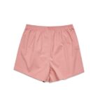 Pink boxer shorts with an elastic waistband displayed on a white background.