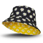 Aero Reversible Bucket Hat: black with white daisies outside, yellow inside.