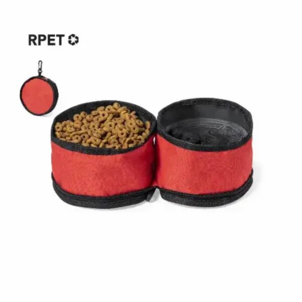 Red foldable pet travel bowl with compartments, one holding kibble and the other a water bowl.