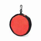 Round red zippered pouch with black trim and a clip attached at the top.