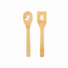Two wooden utensils with cut-out shapes, one of a reindeer and one of a Christmas tree.