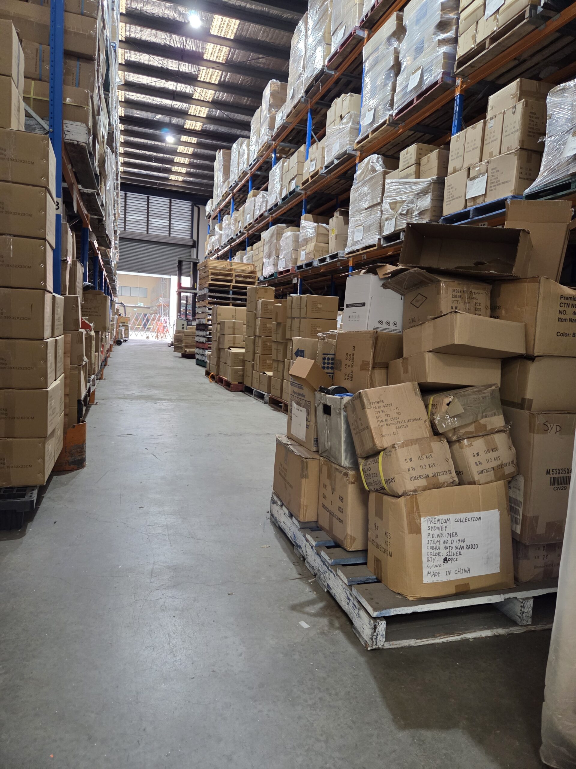 View of a hallway with lots of box as stocks