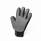 Gray silicone pet grooming glove with rubber bristles, standing upright on a white background.