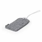Gray felt luggage tag with a clear strap, lying on a white background.