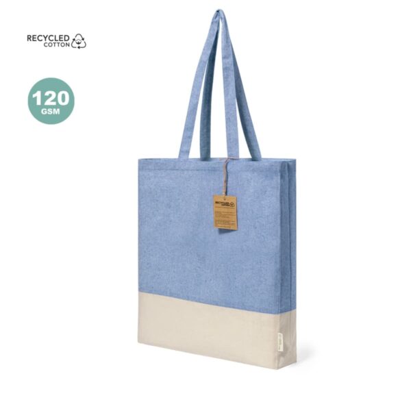 Blue and beige recycled cotton tote bag with handles and a brown tag, 120 GSM label shown.