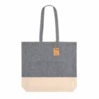 Gray and beige tote bag with long handles and a small brown tag attached.