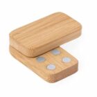 Two rectangular wooden pieces with magnets, slightly separated, on a white background.