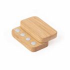 Two rectangular wooden blocks with four silver circular magnets on one side.