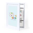 White-framed shadow box with cartoon cat artwork, slightly open to reveal hooks inside.
