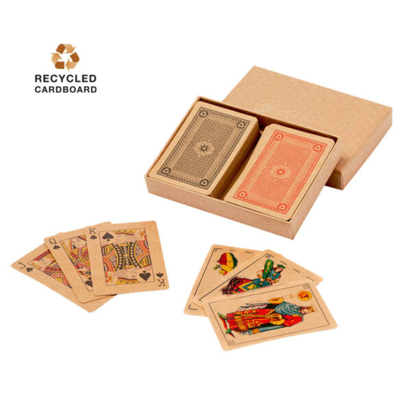 Two decks of playing cards in a box, with some cards spread out, made from recycled cardboard.