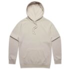 Light beige hooded sweatshirt with front pocket and drawstrings, laid flat on a white background.