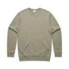 A plain, light olive green crewneck sweatshirt with long sleeves, laid flat.