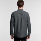 Man in a dark gray long-sleeve shirt facing away, showing the back of the shirt.