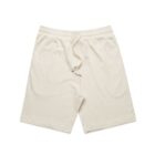 Cream-colored drawstring shorts laid flat on a white background.