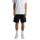 A person wearing a white t-shirt, black shorts, white socks, and white sneakers.