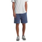 Man in a white t-shirt, blue shorts, and gray sneakers standing against a white background.