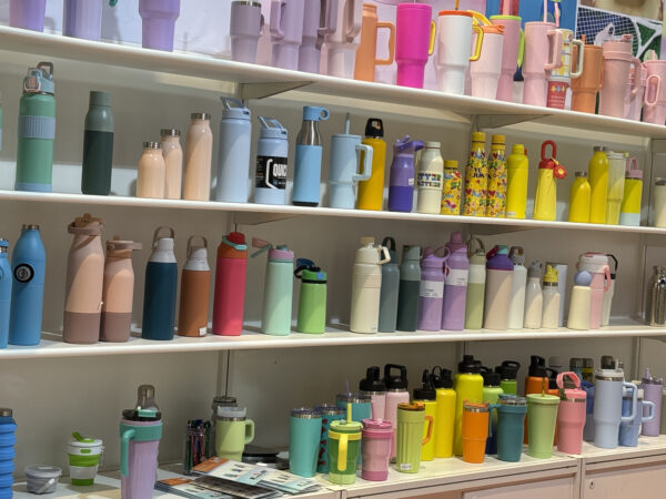 different coloured bottles in shelves