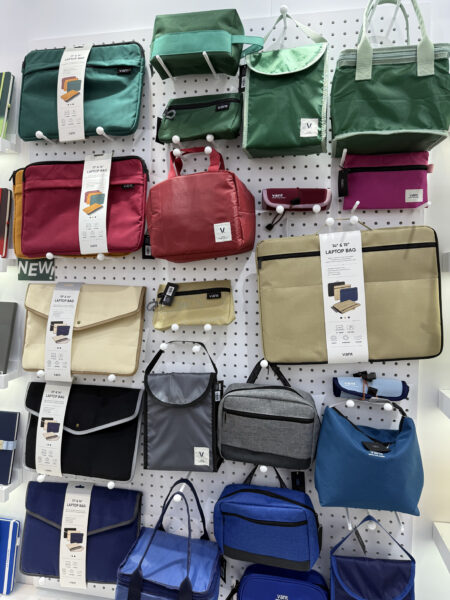 different types of colours of bags hanging