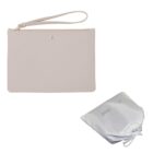 Beige wristlet pouch with a small gold button, next to a white drawstring bag.
