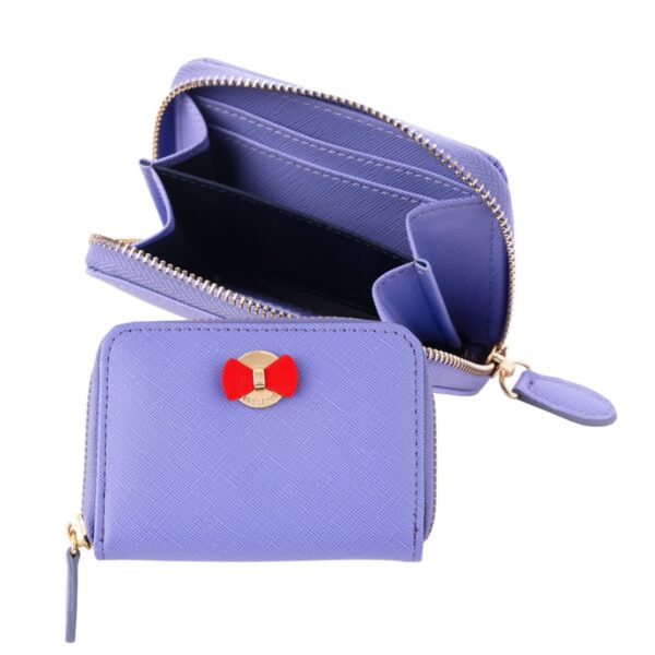 Small purple wallet with a red bow and gold accent, shown open and closed.