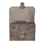 Open suede and leather wallet with gold clasp and zipper pocket, viewed from above.