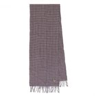 Brown and white houndstooth scarf with fringe on both ends, laid flat on a white background.