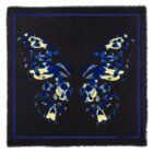 A black scarf with a blue and yellow abstract butterfly design in the center.