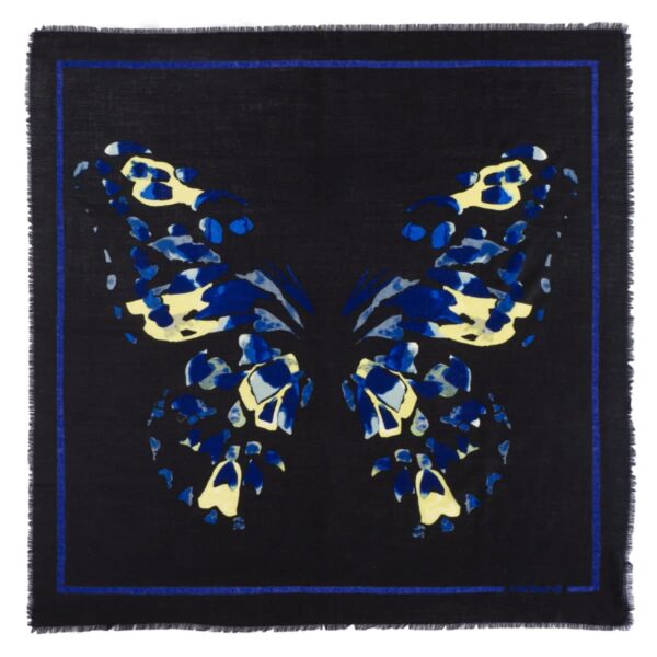 A black scarf with a blue and yellow abstract butterfly design in the center.