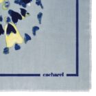 Light blue scarf with abstract blue and yellow pattern, cacharel logo in corner.