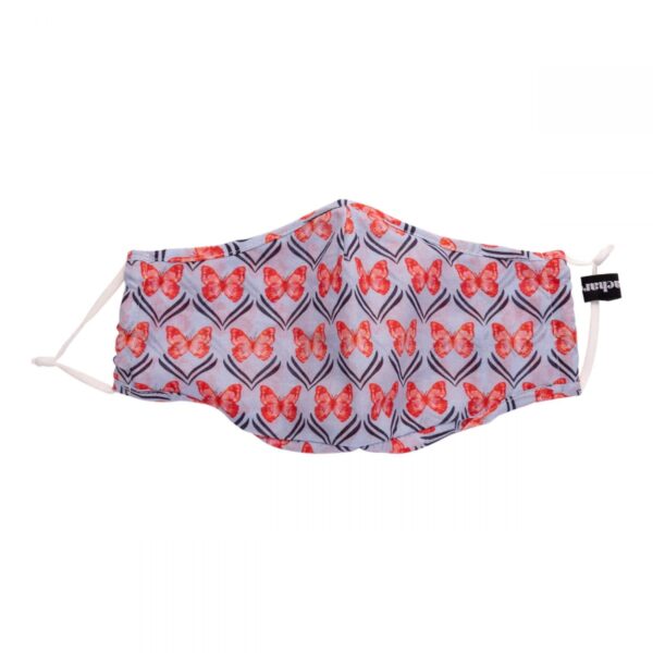 Cloth face mask with red butterfly pattern on a light background.