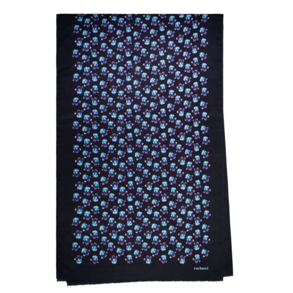 Black scarf with a blue and purple floral pattern and a small Cacharel logo in the corner.