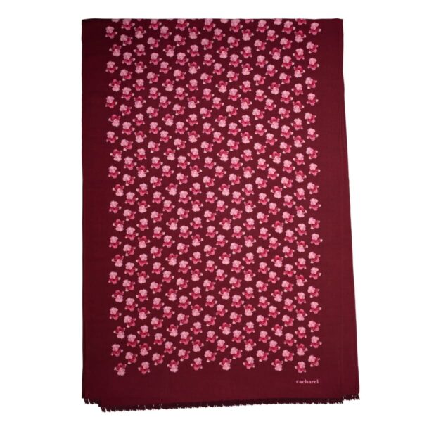 Maroon scarf with a pattern of small pink flowers and fringed edges.