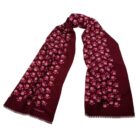 Burgundy scarf with scattered pink floral pattern and fringed edges.