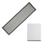 A gray table runner with dark edges next to a plain white rectangular box.