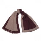 A two-toned beige and burgundy scarf with fringed edges, laid flat on a white background.