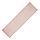 Light pink rectangular table runner with a slightly darker pink border and fringed edges.