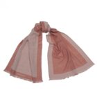 Light pink and mauve rectangular scarf with fringed edges, tied in a loose knot.