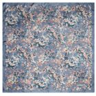 Blue Cacharel scarf with scattered small floral pattern in pink, white, and dark blue.