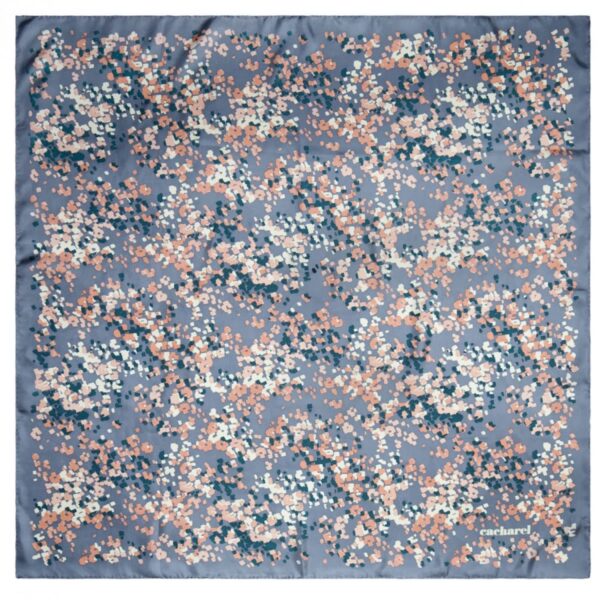 Blue silk scarf with scattered pink, white, and dark blue floral pattern, cacharel logo.